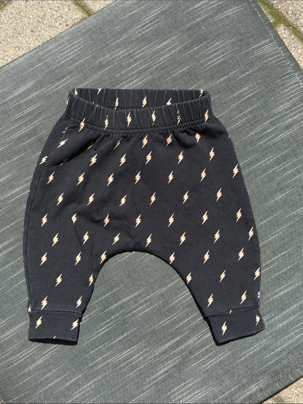 Rock Your Baby Black Jogger Pants with Cream Lightning Bolts